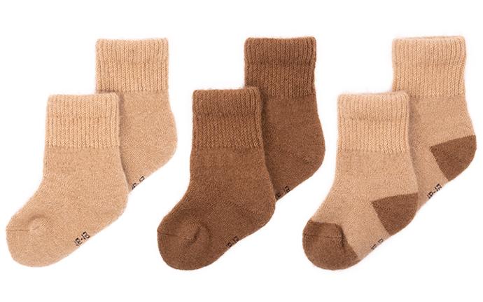 Three pairs of children's socks in beige, brown and beige-brown